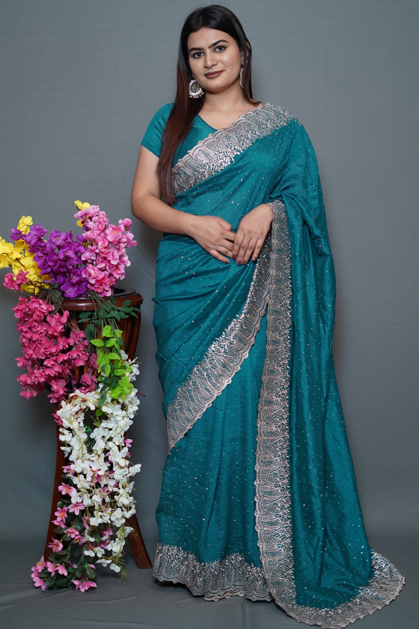 Teal Blue Georgette Saree with Silver Embroidered Lace Border