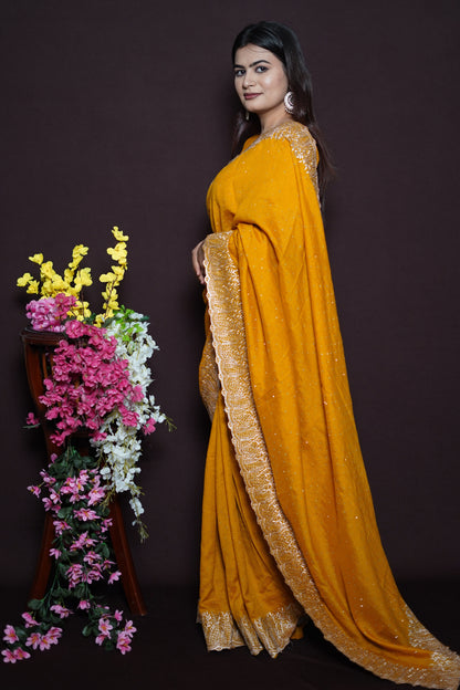 Mustard Yellow Georgette Saree with Golden Embroidered Lace Border