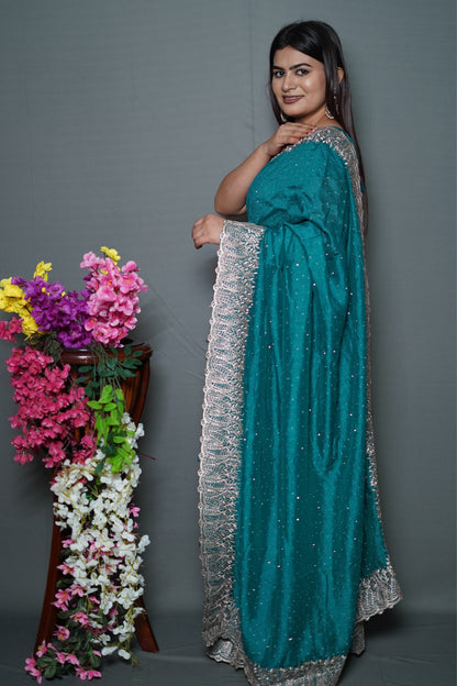 Teal Blue Georgette Saree with Silver Embroidered Lace Border