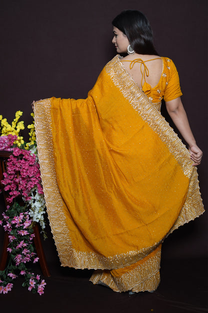 Mustard Yellow Georgette Saree with Golden Embroidered Lace Border