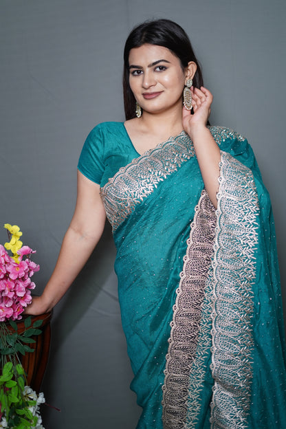 Teal Blue Georgette Saree with Silver Embroidered Lace Border