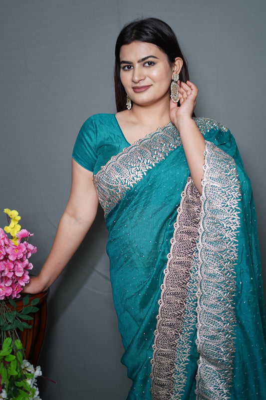 Teal Blue Georgette Saree with Silver Embroidered Lace Border