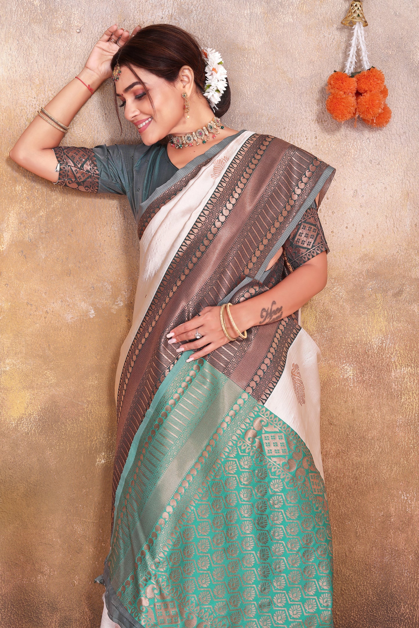 Cream Kanjivaram Silk Saree with Green & Brown Zari Border